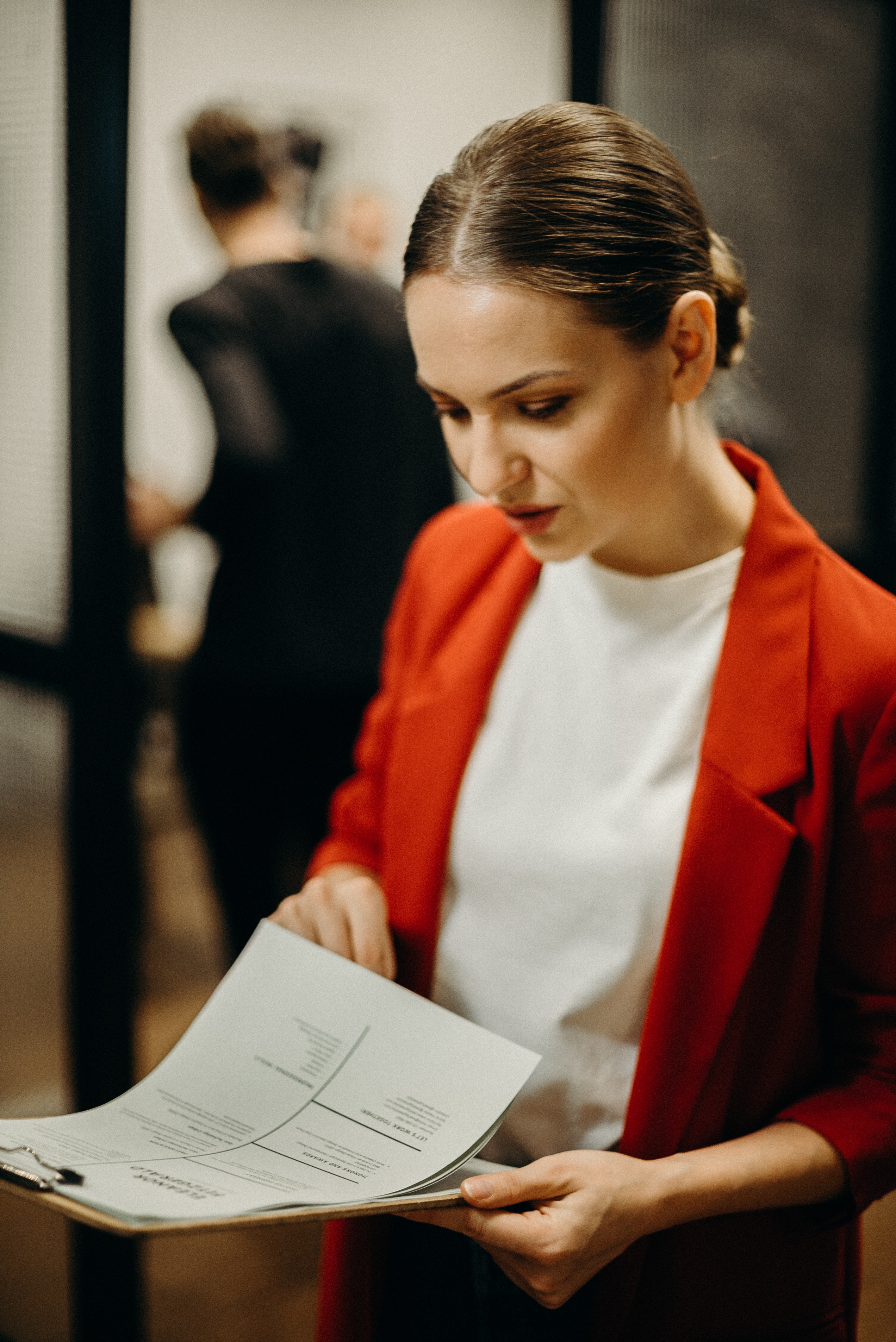 Professional woman with clipboard